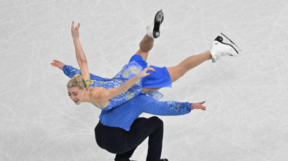 Canadian ice dancers put 'dark times' behind with Olympic medal