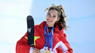 Eileen Gu switches slopes for catwalk after Olympic flourish