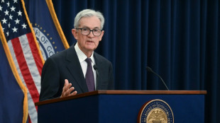 Mixed day for global stocks amid trade angst, Powell comments