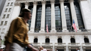 Wall Street finit dans le vert apr&egrave;s la modeste hausse des taux de la Fed