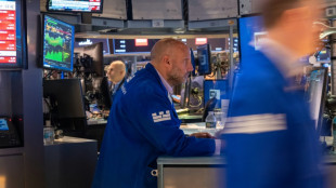 Wall Street termine en baisse, alarm&eacute;e par la posture offensive de la Fed 