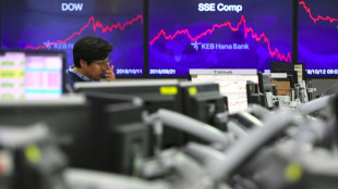 Asian markets tumble as tech bubble fears grow