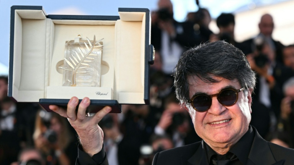 Iranian filmmaker Panahi urges 'freedom' as he wins Cannes top prize