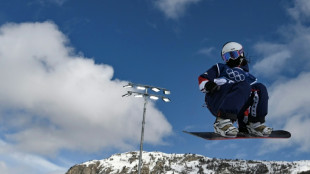 US snowboard star Kim stays on track for historic Olympic hat-trick