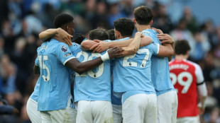 Man City beat Arsenal to seize control of title race, Liverpool win