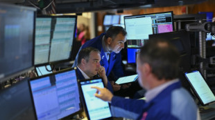 Wall Street termine partag&eacute;e, surmonte l'anxi&eacute;t&eacute; g&eacute;opolitique