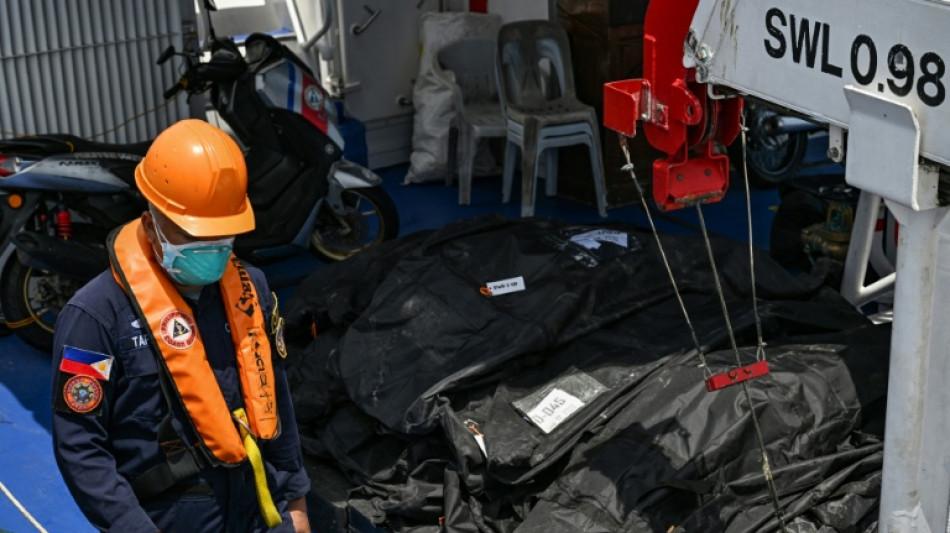 Philippine rescuers pull more victims from charred ferry