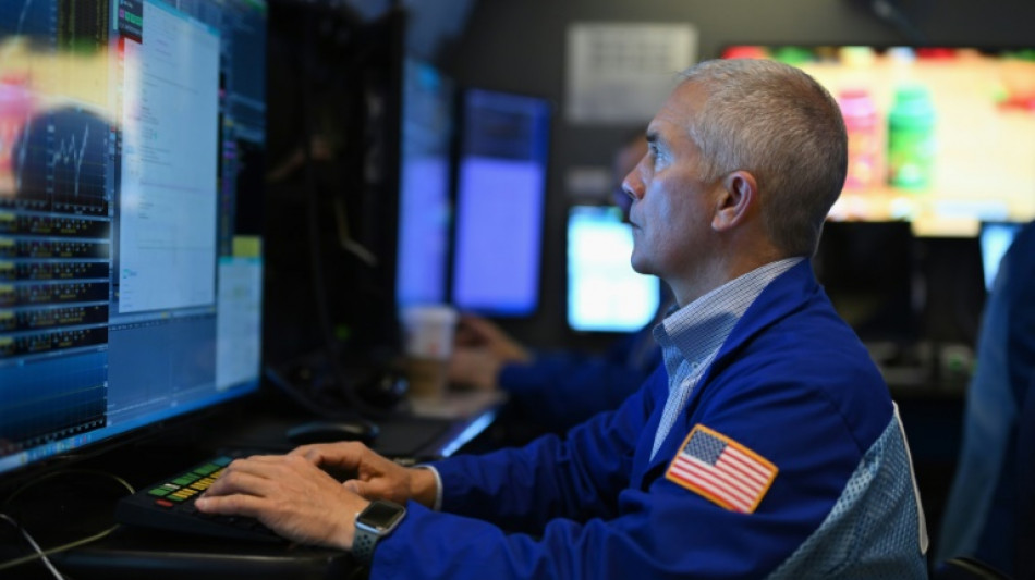 Wall Street poursuit son ascension, aid&eacute;e par un bon indicateur d'activit&eacute;