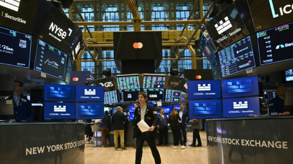 Wall Street termine en hausse, nouveaux records pour Dow Jones et S&P 500