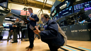 Wall Street termine de peu en territoire n&eacute;gatif apr&egrave;s des indicateurs mitig&eacute;s