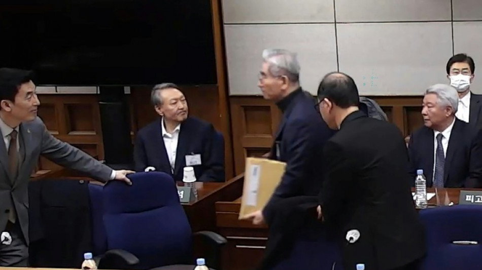 Ex-South Korea leader apologises for martial law crisis