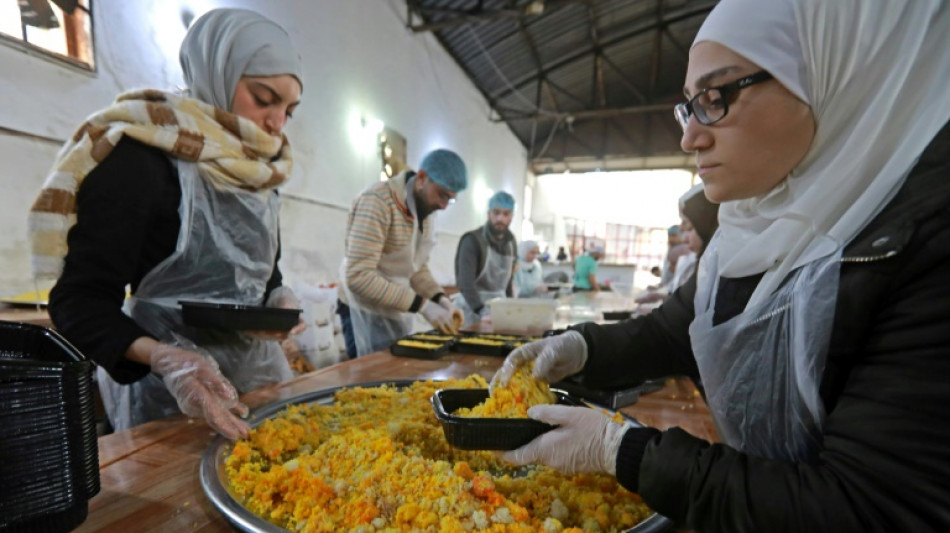 Hot meals, kids' theatre: volunteers help Syria quake survivors