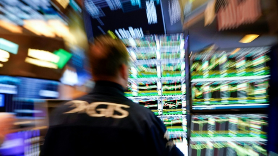 Wall Street ouvre en baisse, prudente face aux droits de douane et &agrave; la Fed